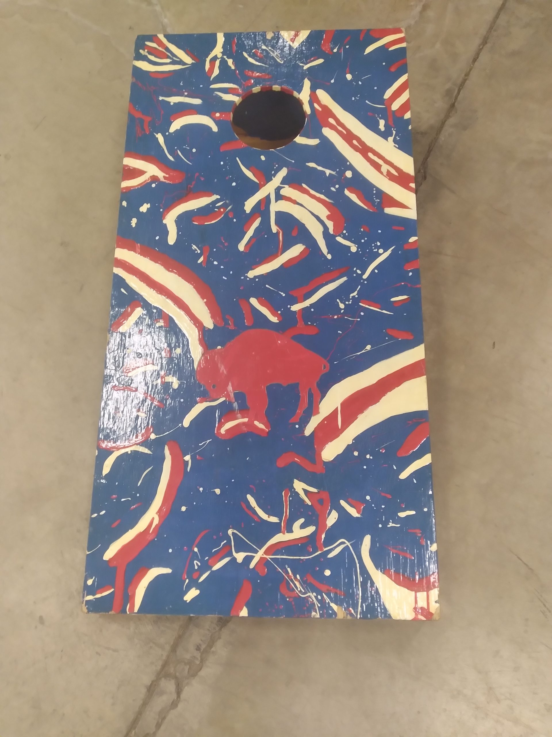 Corn Hole being played at a tailgating party scaled