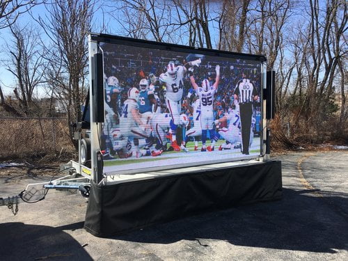 LED screen showing day football game