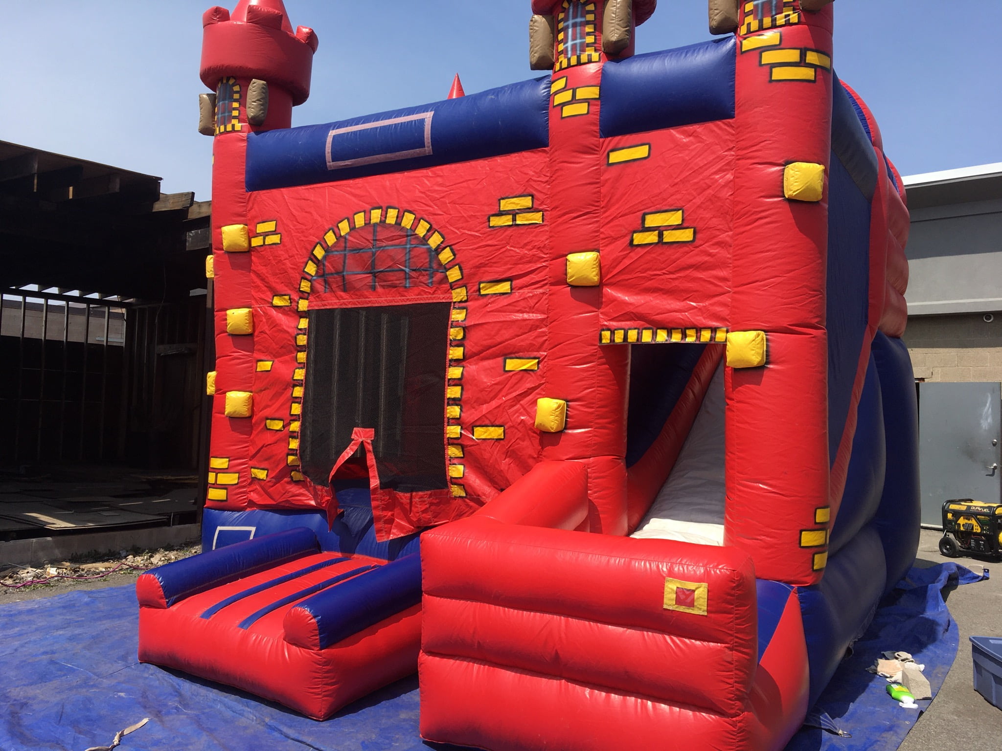 Red Brick Castle with Slide in school parking lot