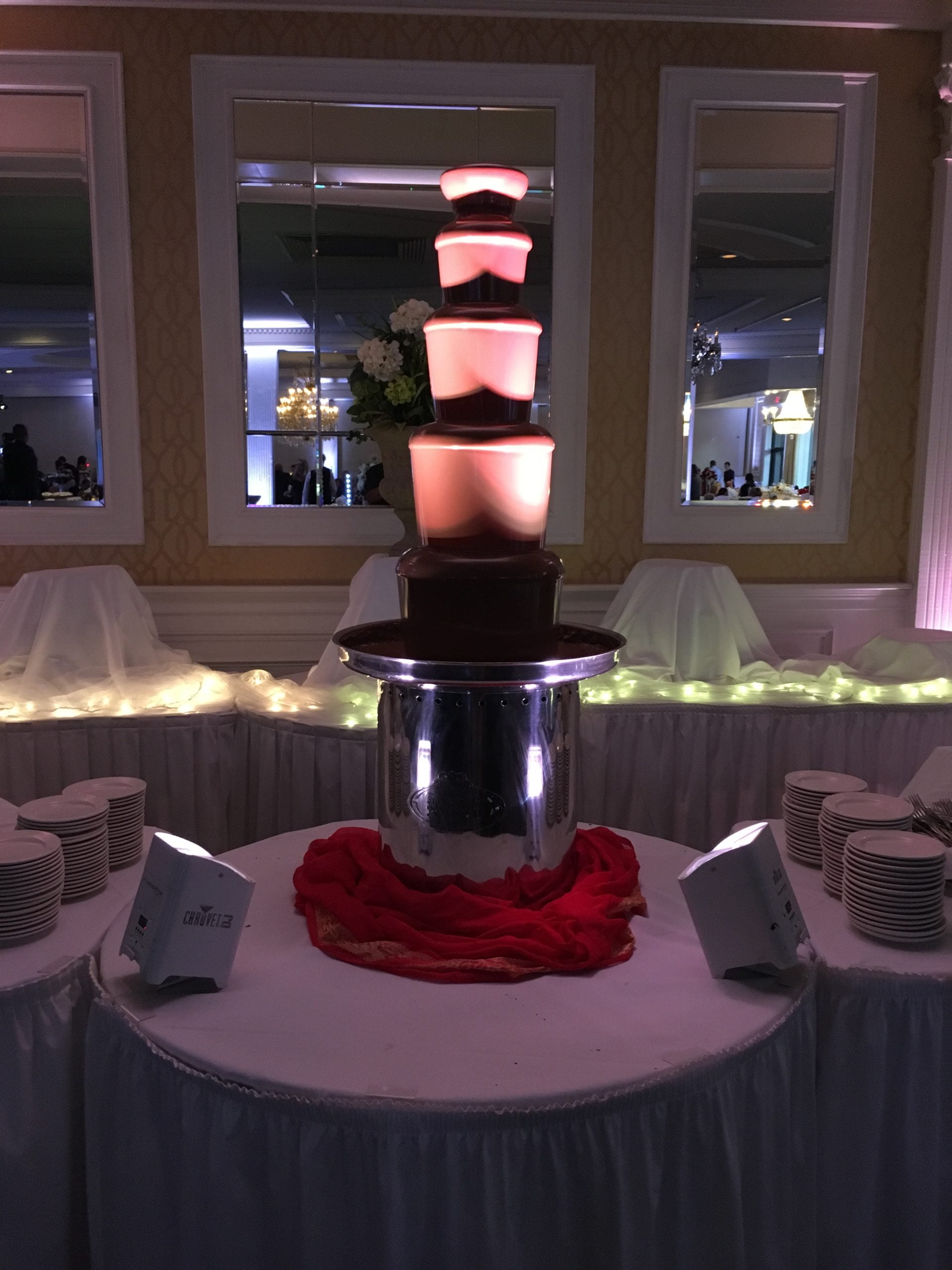 cascading chocolate lit up from beneath fountain scaled