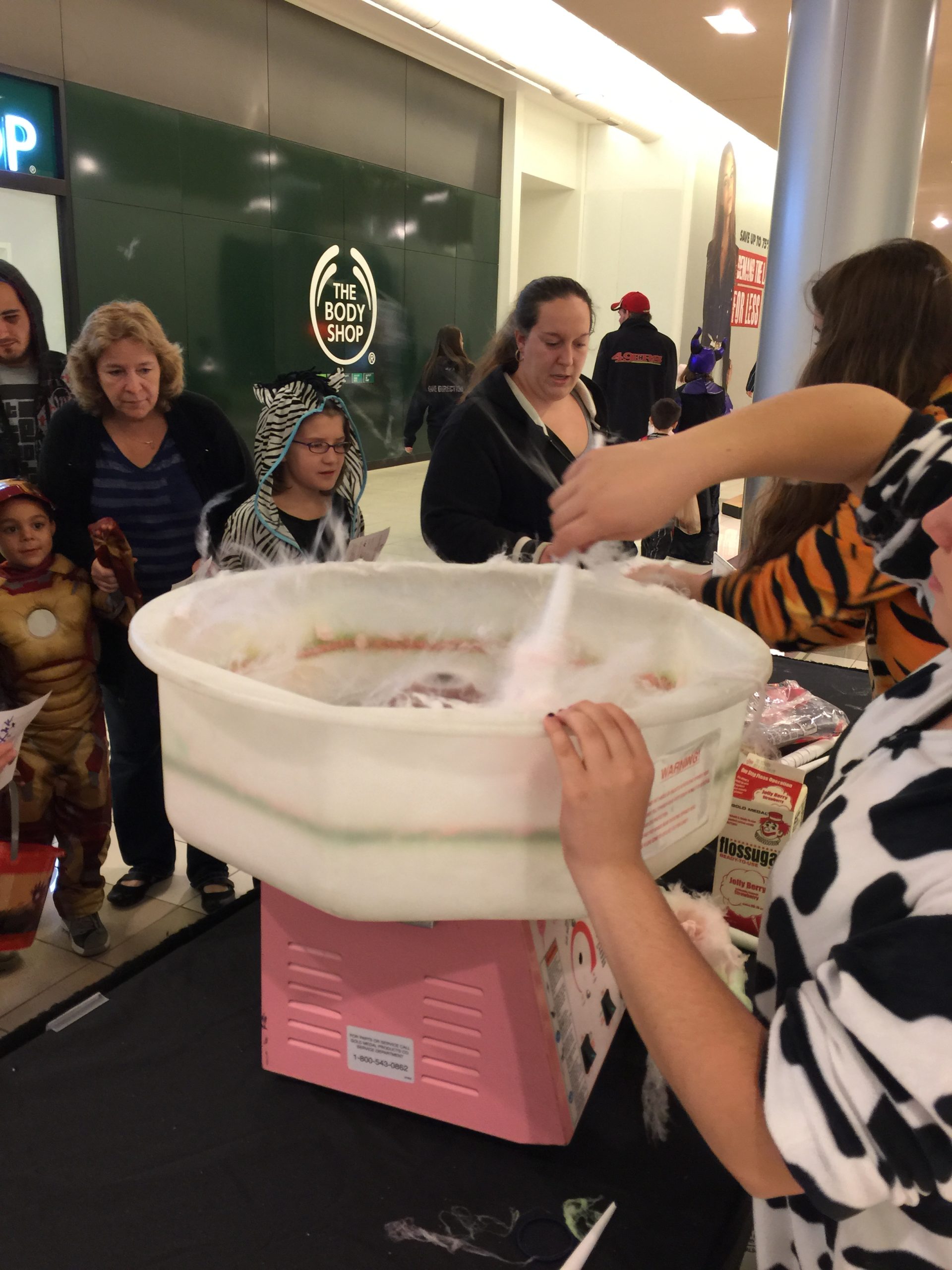 cotton candy being made at Boo Bash festival scaled