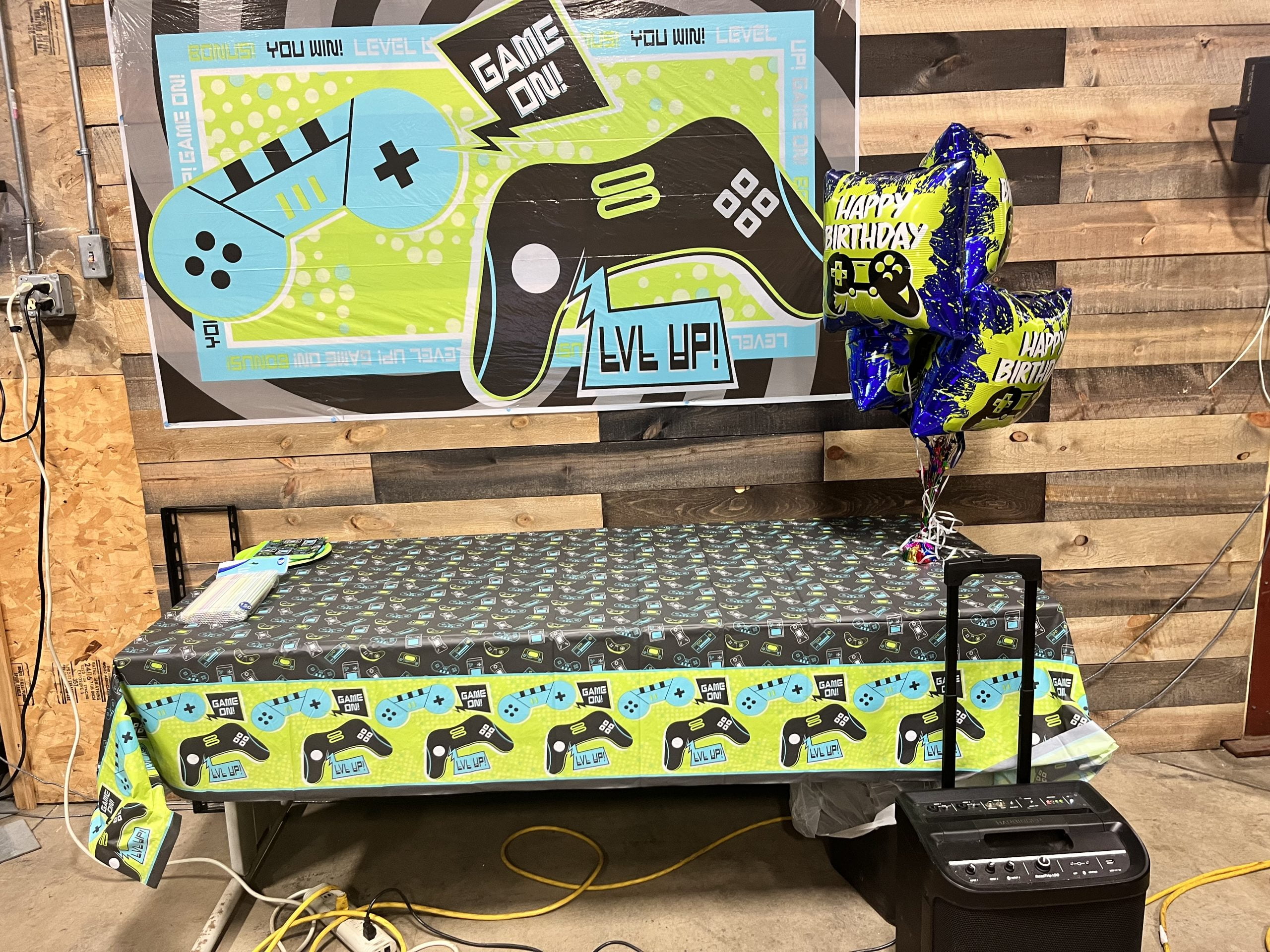 gift table with game party back drop scaled