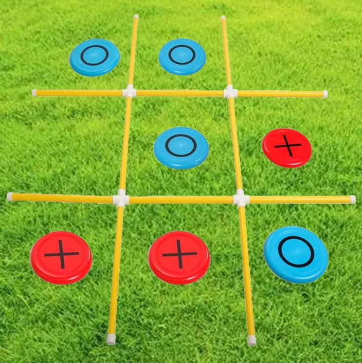 playing tic tac toe on grassy backyard