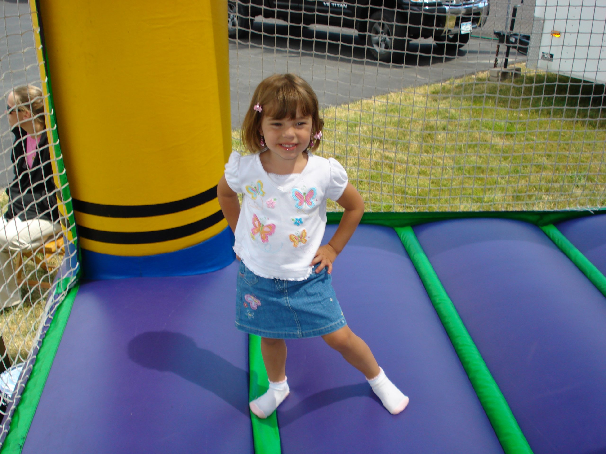 posing in bounce house scaled