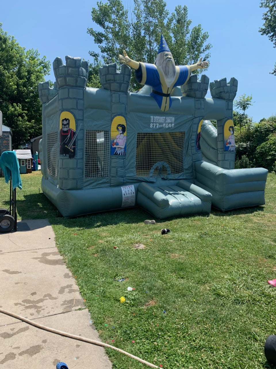 wizard bounce house with obstacle area